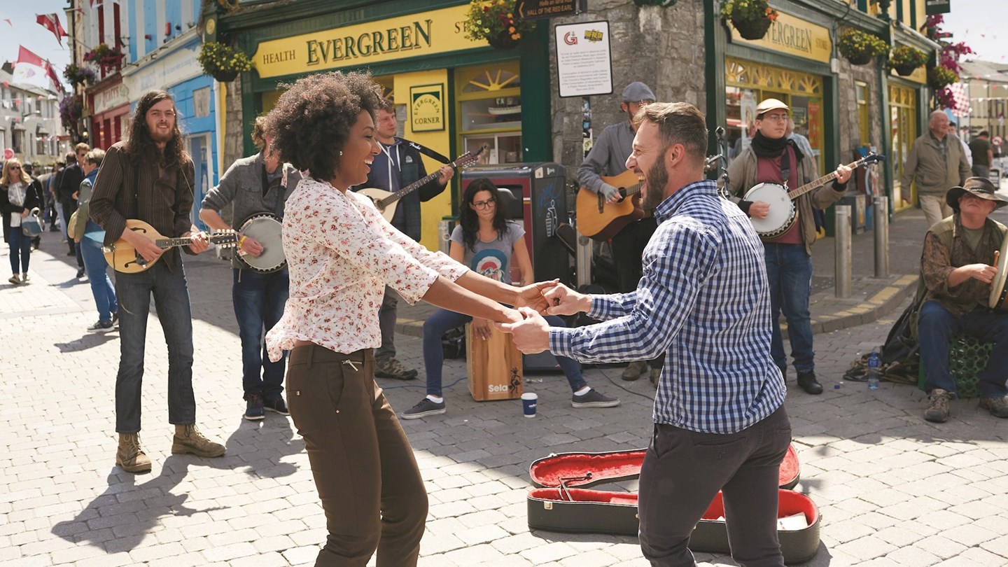 Couple dancing in streets of Galway